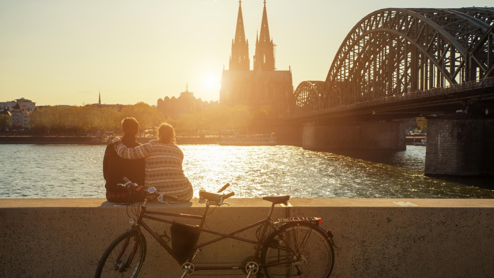 Young romantic couple spending their vacation in Cologne, Germany.